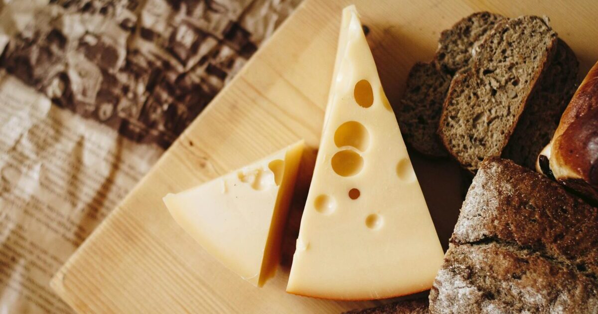 sliced cheese on brown table top